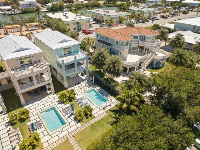 an aerial view of a city with lawn chairs