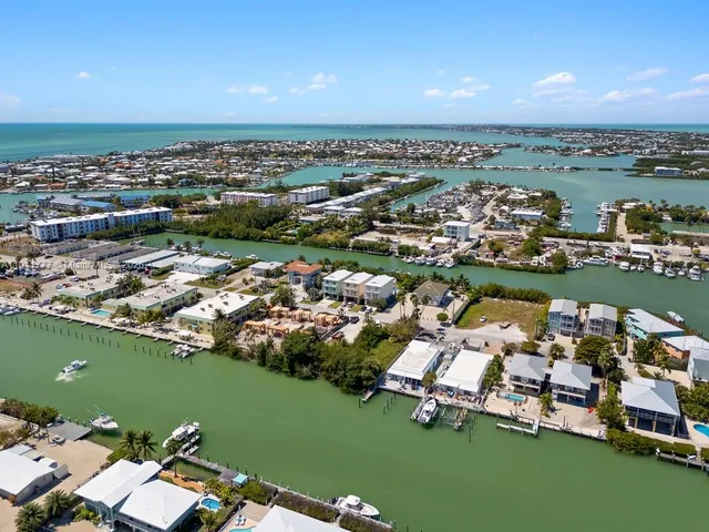a bedroom with a balcony a bed and a couch
