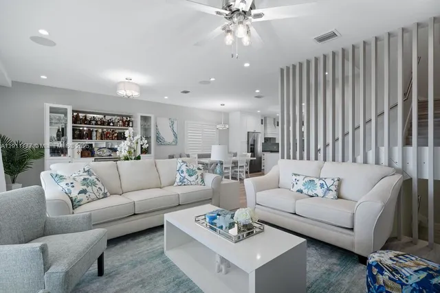 a kitchen with a dining table and chairs