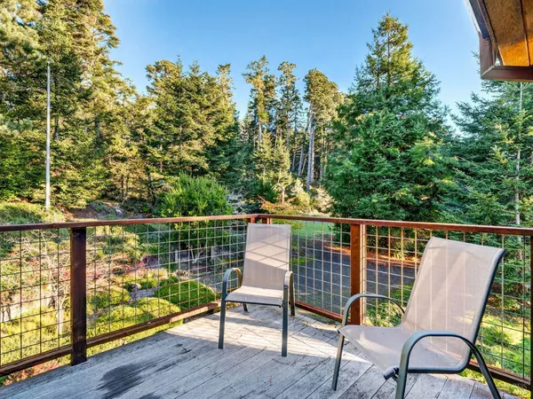 a balcony with wooden floor