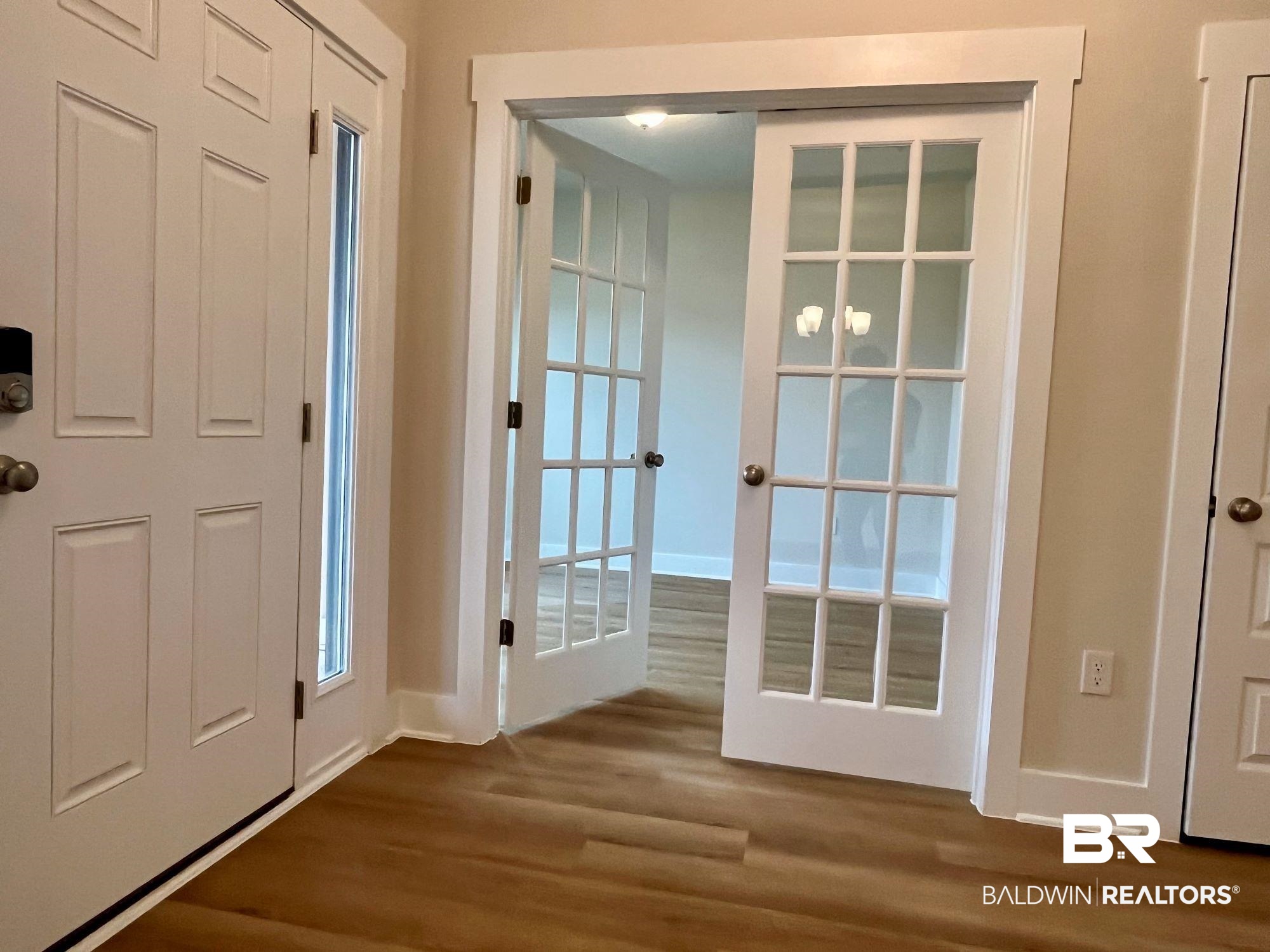 330 Barndling Street Fairhope, AL 36532 - Photo 6 of 31 Doorway with hardwood / wood-style flooring