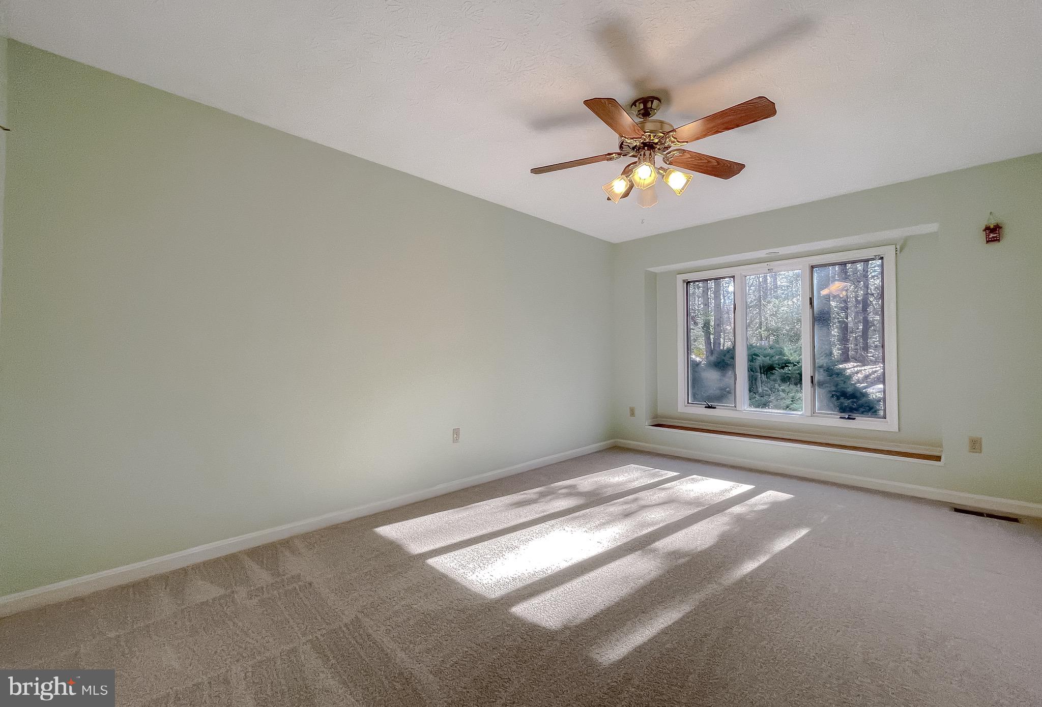 288 Elkins Lane Lusby, MD 20657 - Photo 17 of 73 a view of an empty room with a window