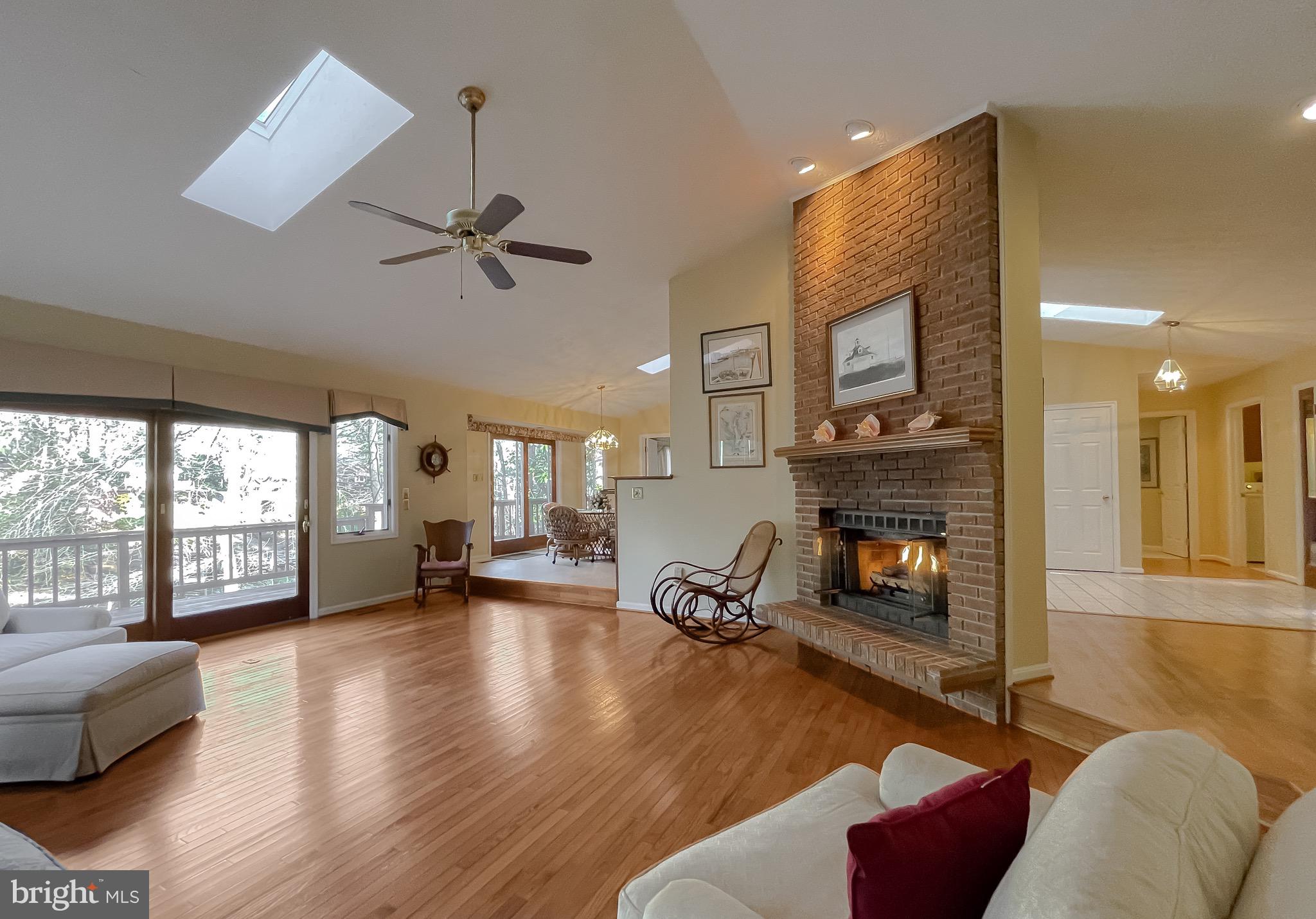 288 Elkins Lane Lusby, MD 20657 - Photo 26 of 73 a living room with furniture or couch and a fireplace