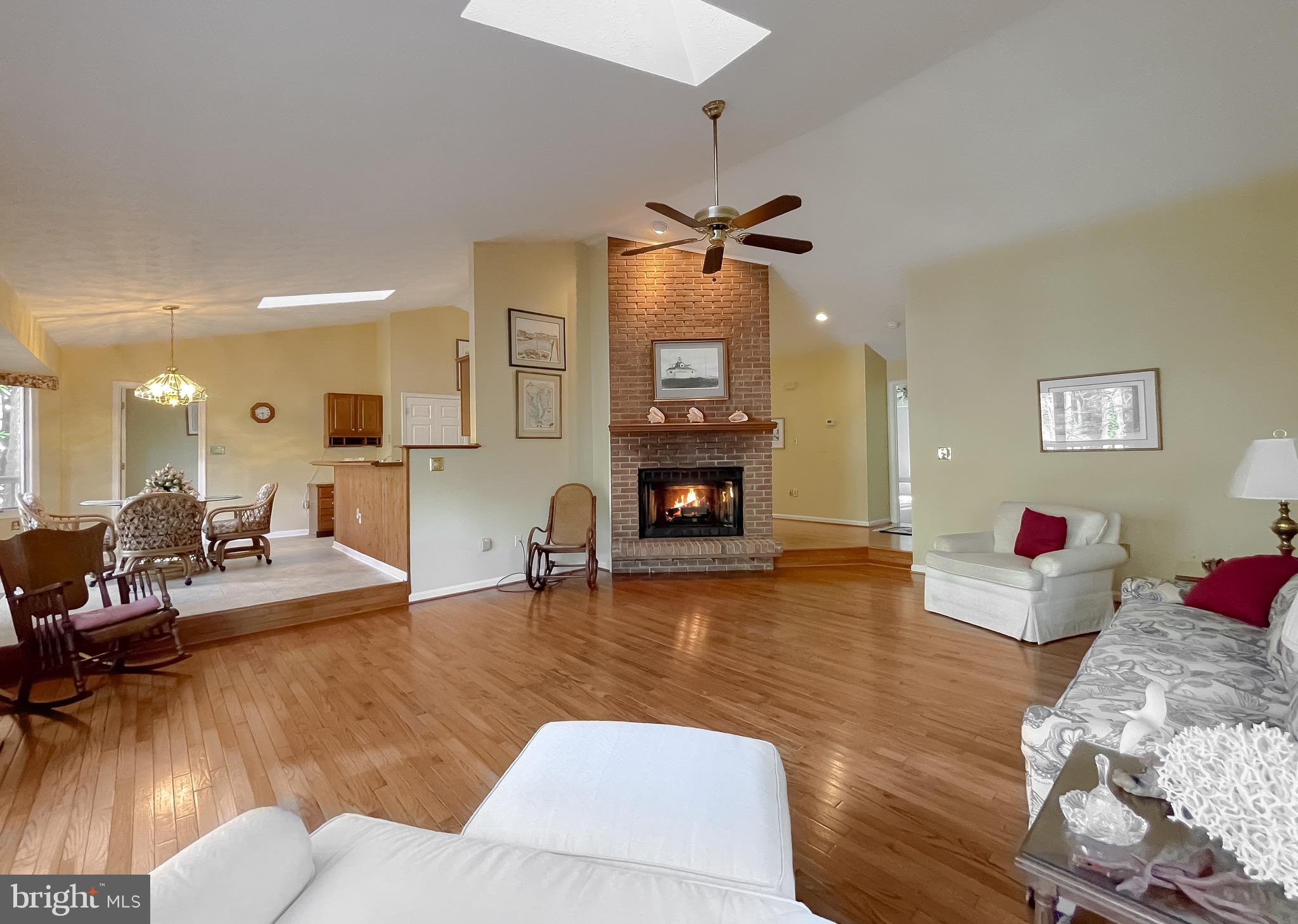 288 Elkins Lane Lusby, MD 20657 - Photo 28 of 73 a living room with furniture and a wooden floor