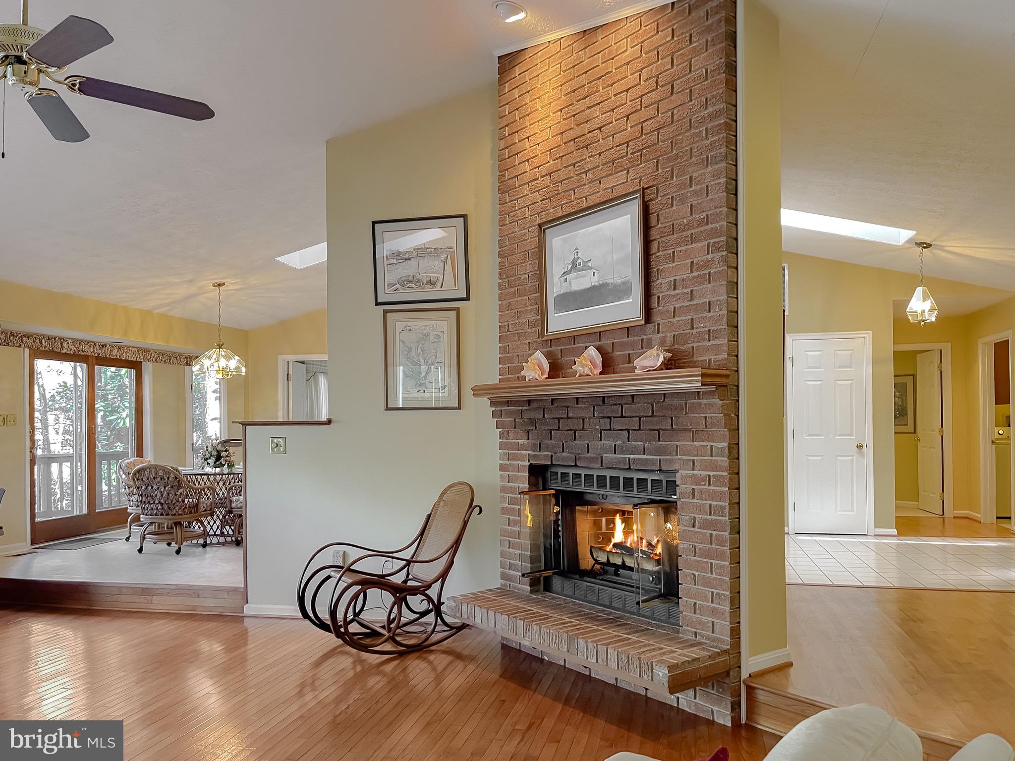 288 Elkins Lane Lusby, MD 20657 - Photo 29 of 73 a living room with furniture and a fireplace