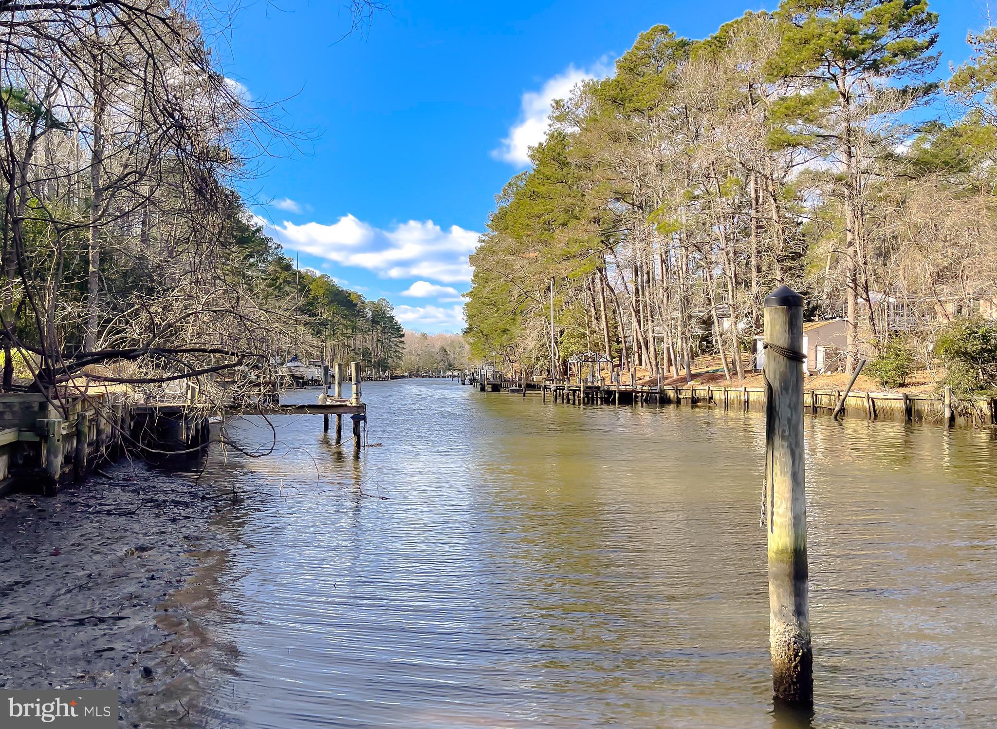 288 Elkins Lane Lusby, MD 20657 - Photo 58 of 73 a view of a lake with houses
