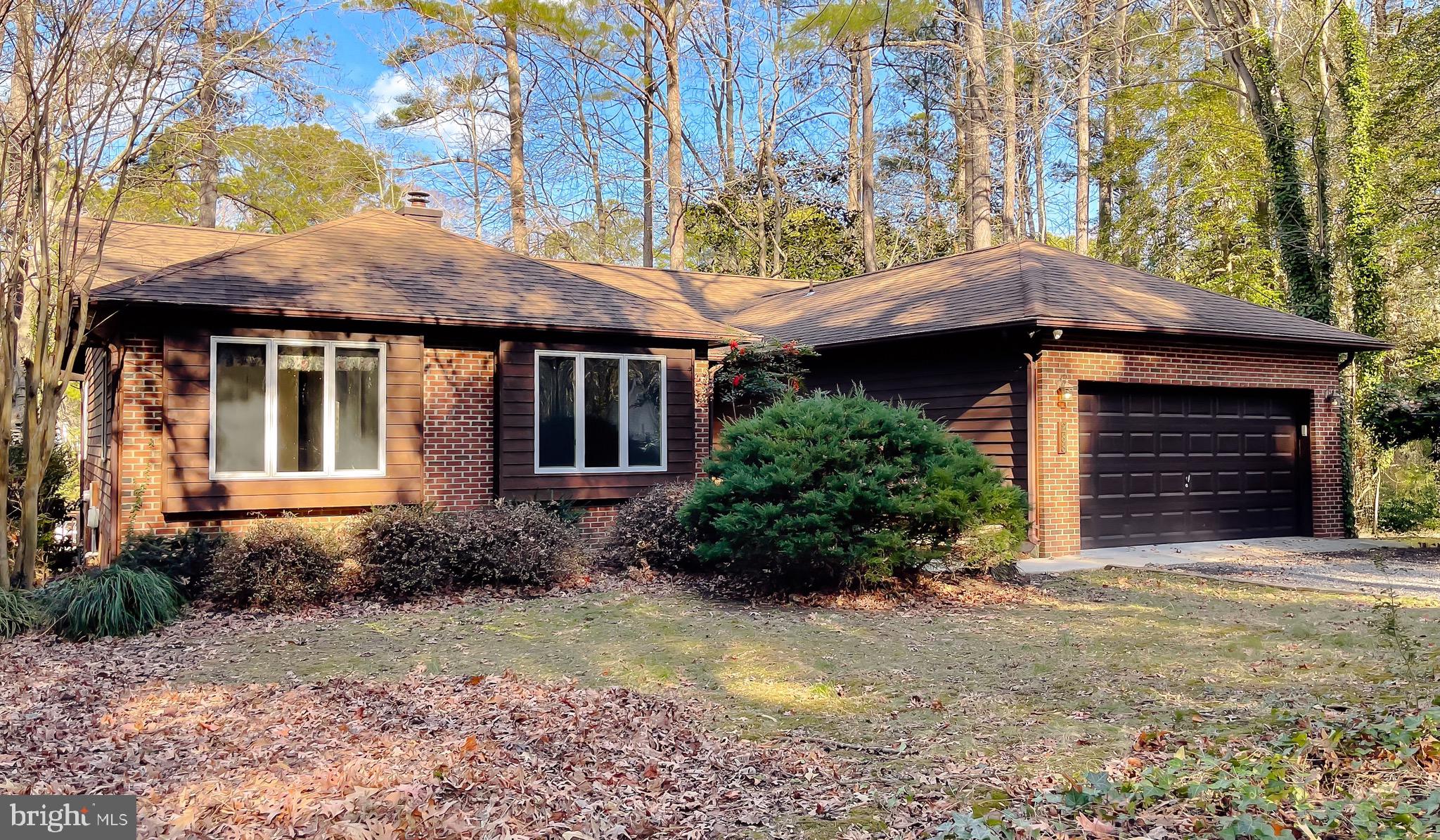 288 Elkins Lane Lusby, MD 20657 - Photo 66 of 73 a front view of a house with a garden