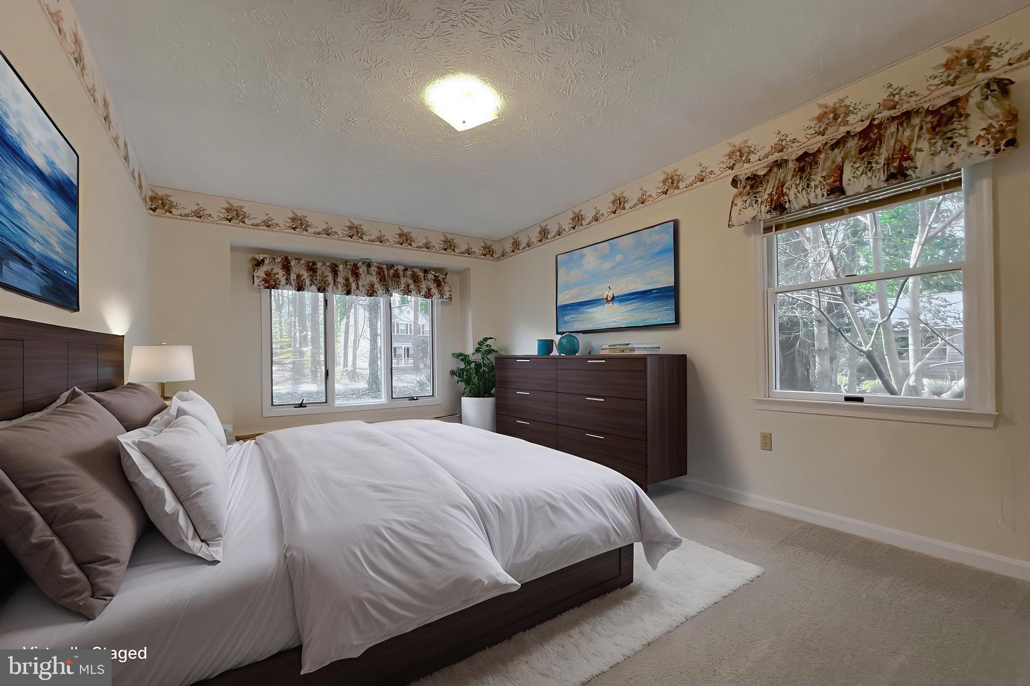 288 Elkins Lane Lusby, MD 20657 - Photo 69 of 73 a bedroom with a bed dresser and window