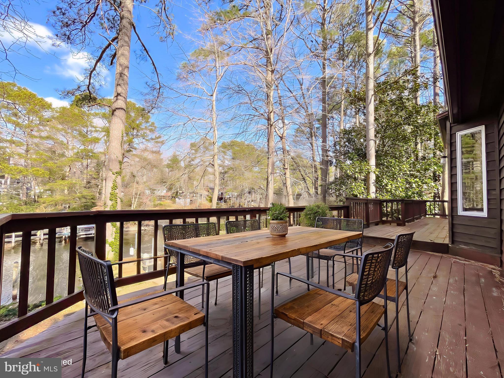 288 Elkins Lane Lusby, MD 20657 - Photo 73 of 73 a view of a balcony with furniture and wooden floor