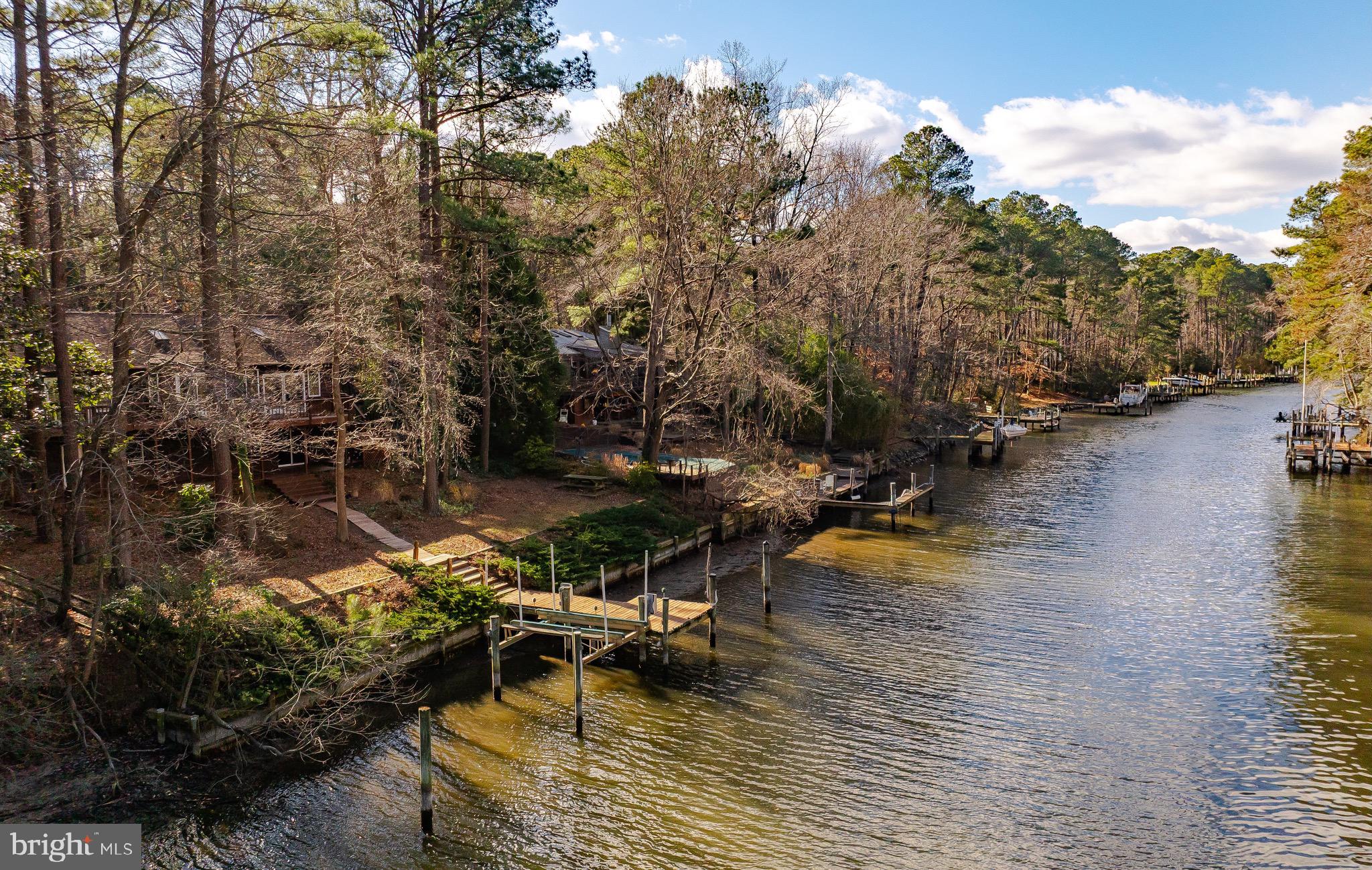 288 Elkins Lane Lusby, MD 20657 - Photo 8 of 73 a view of a lake with a yard