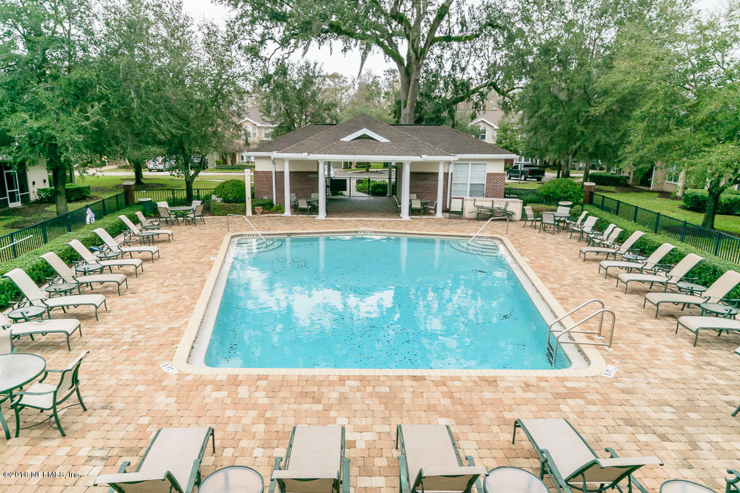 5663 Greenland Road, Unit 1008 Jacksonville, FL 32258 - Photo 23 of 24 a view of a house with swimming pool