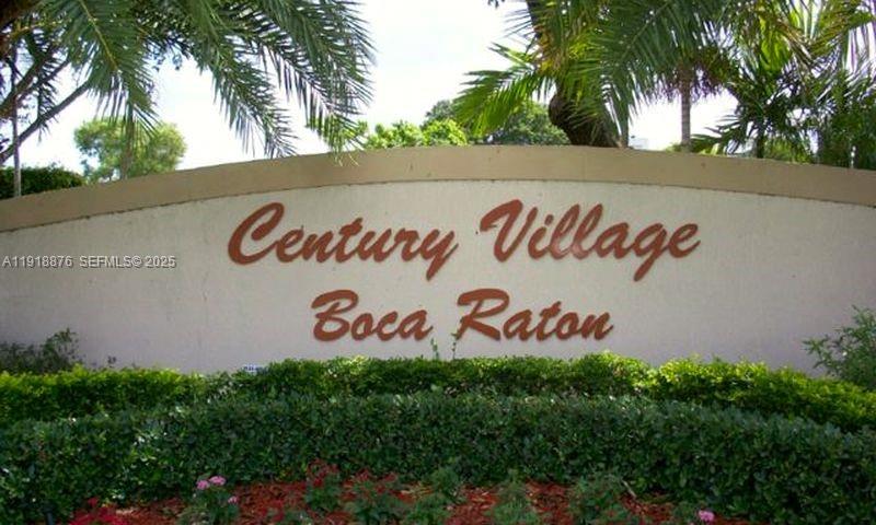 2052 Exeter C, Unit 2052 Boca Raton, FL 33434 - Photo 11 of 35 a sign that is on the wall of a building