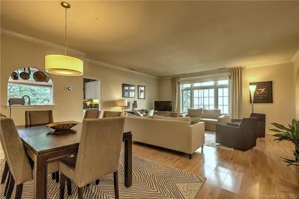 a spacious bedroom with a bed and a couch