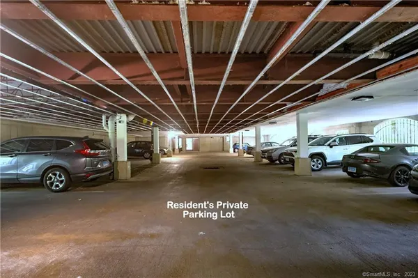 a view of parking space with a parking space