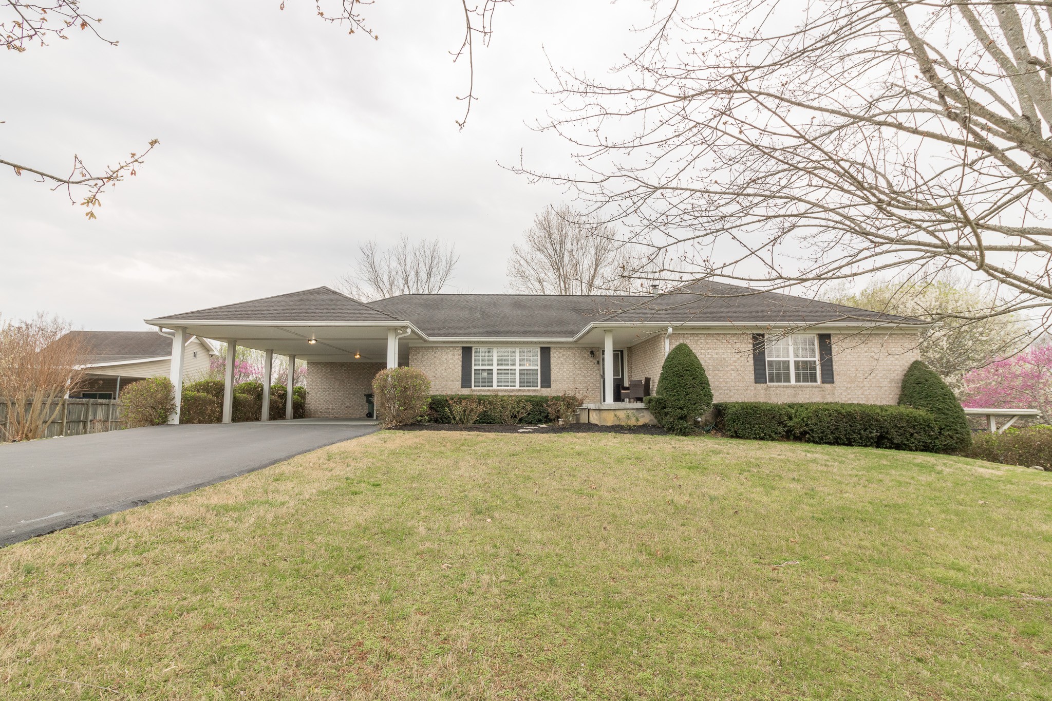 8602 Hickory Ridge Road Mount Juliet, TN 37122 - Photo 1 of 68 a front view of a house with a yard and garage