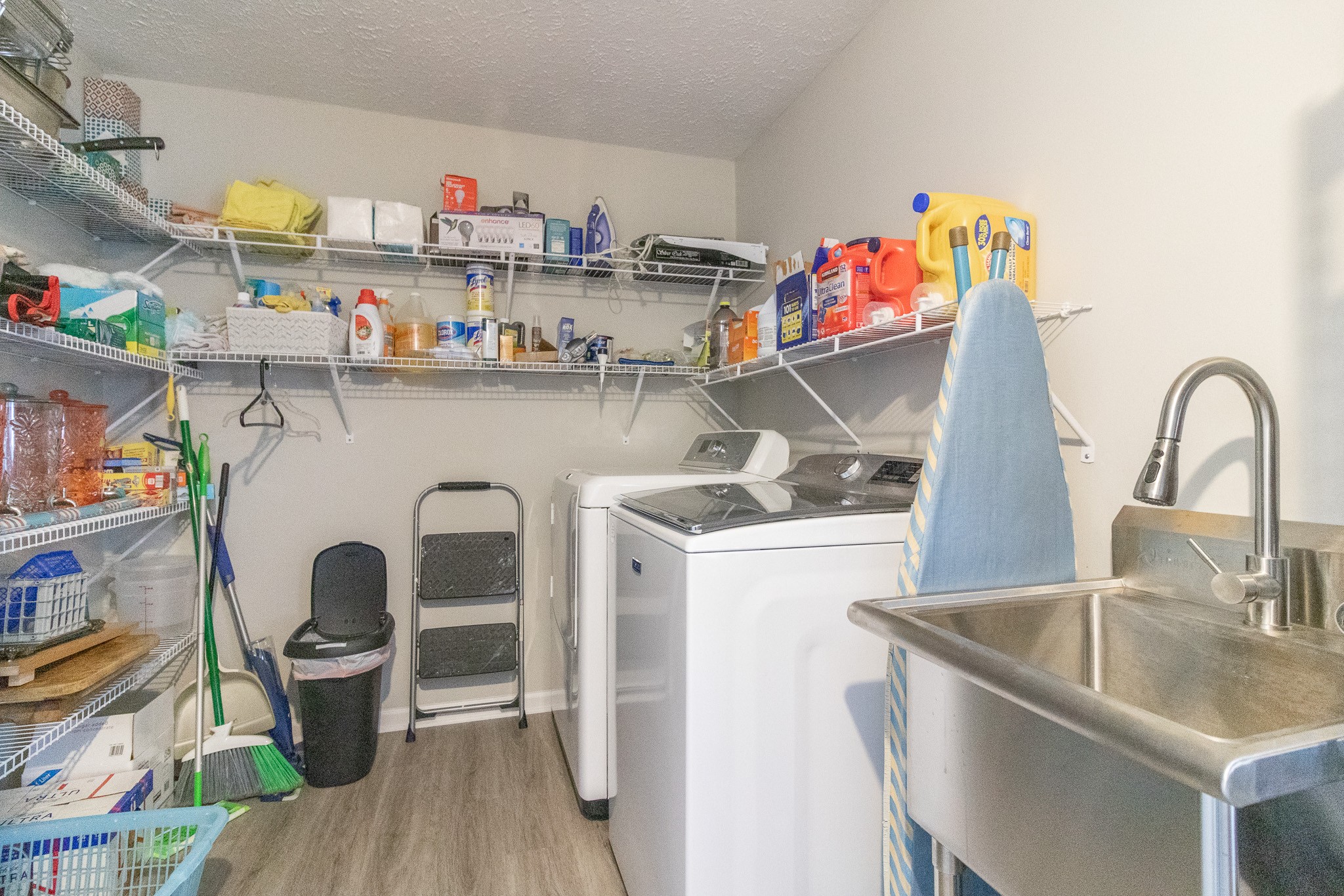 8602 Hickory Ridge Road Mount Juliet, TN 37122 - Photo 28 of 68 a kitchen with a refrigerator and a sink