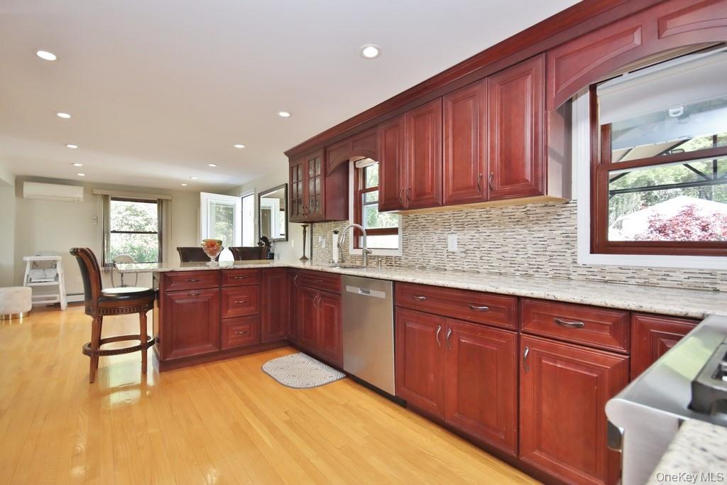 30 Granite Springs Road Granite Springs, NY 10527 - Photo 5 of 37 a kitchen with wooden cabinets and sink