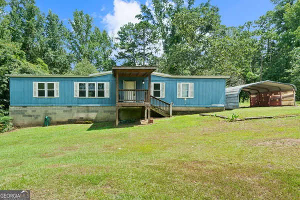 a house view with a outdoor space