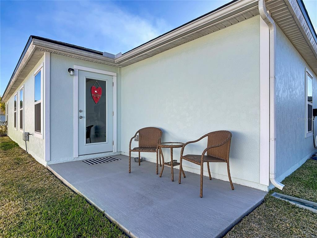 64 Bogey Place Bunnell, FL 32110 - Photo 35 of 55 a view of two chairs in a room