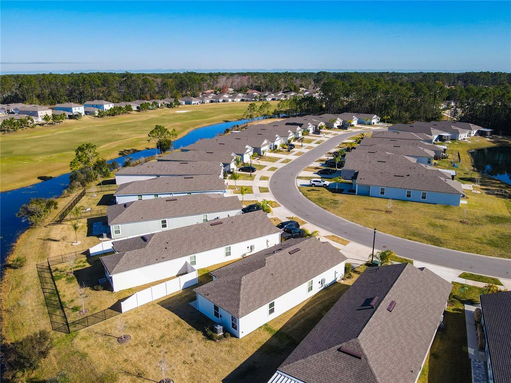 64 Bogey Place Bunnell, FL 32110 - Photo 36 of 55 an aerial view of a house with a swimming pool