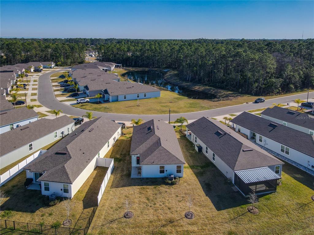 64 Bogey Place Bunnell, FL 32110 - Photo 37 of 55 an aerial view of a house with swimming pool