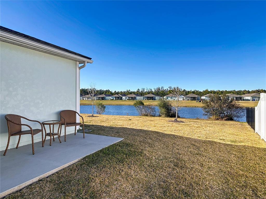 64 Bogey Place Bunnell, FL 32110 - Photo 4 of 55 a view of a swimming pool and lounge chair