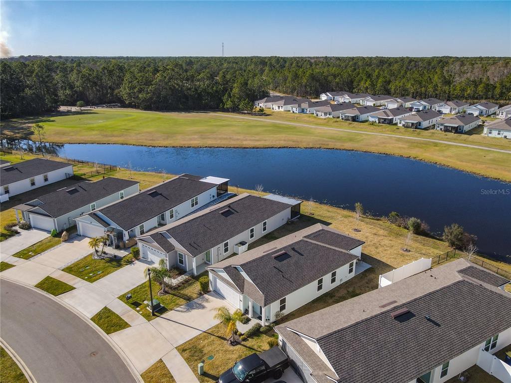64 Bogey Place Bunnell, FL 32110 - Photo 49 of 55 an aerial view of a house with swimming pool