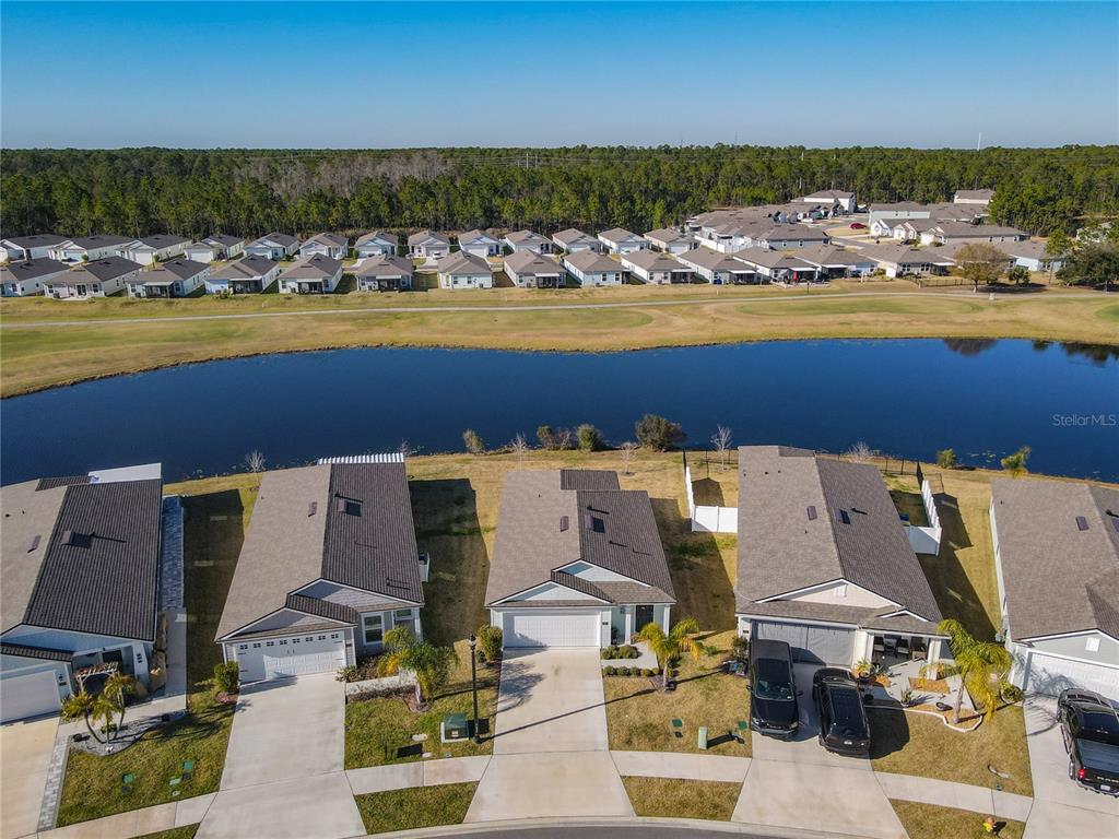 64 Bogey Place Bunnell, FL 32110 - Photo 50 of 55 an aerial view of residential houses with outdoor space