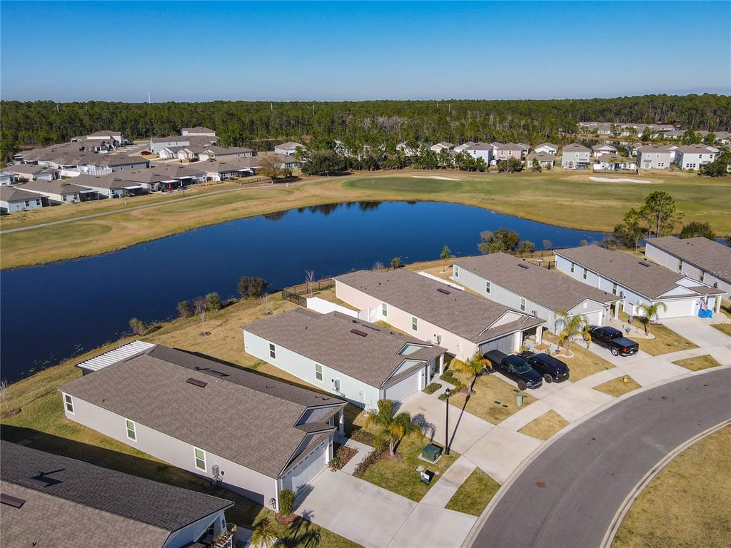 64 Bogey Place Bunnell, FL 32110 - Photo 51 of 55 an aerial view of residential houses with outdoor space