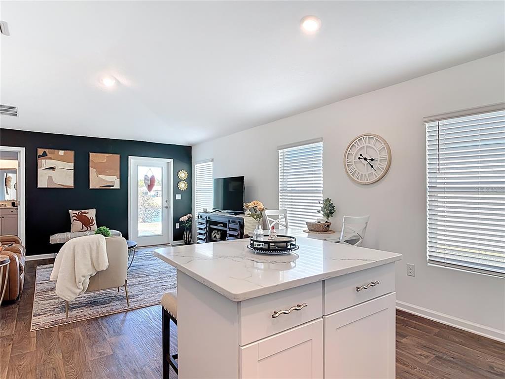 64 Bogey Place Bunnell, FL 32110 - Photo 10 of 55 a view of living room with furniture and wooden floor