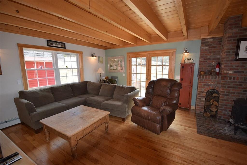 87 Sweet Road Lincoln, ME 04457 - Photo 17 of 35 There are two easy deck access...