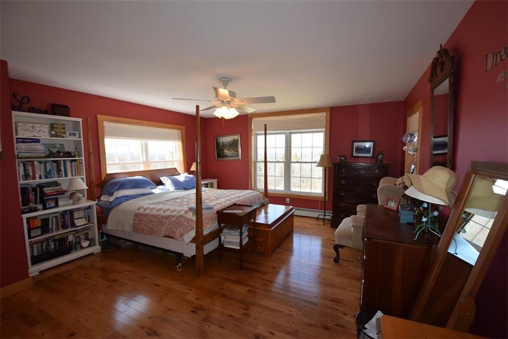 87 Sweet Road Lincoln, ME 04457 - Photo 20 of 35 Master bedroom with red oak flooring...