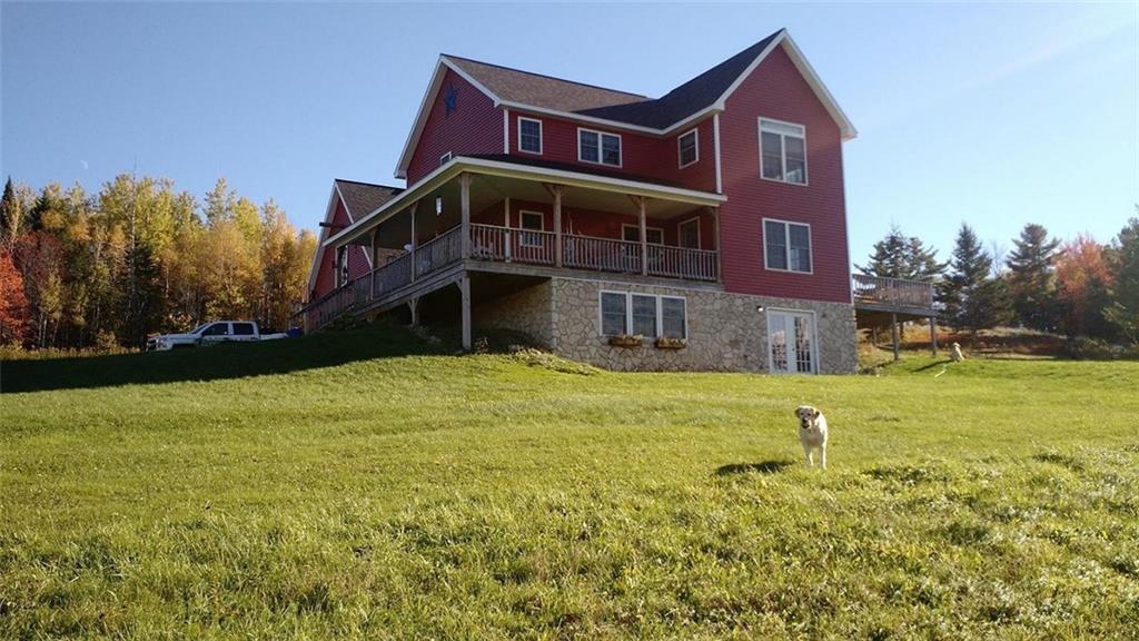87 Sweet Road Lincoln, ME 04457 - Photo 3 of 35 Exterior cultured stone perimeter...