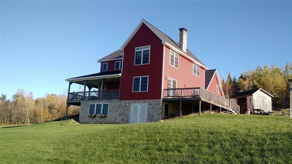 87 Sweet Road Lincoln, ME 04457 - Photo 4 of 35 A spacious deck with access from the...