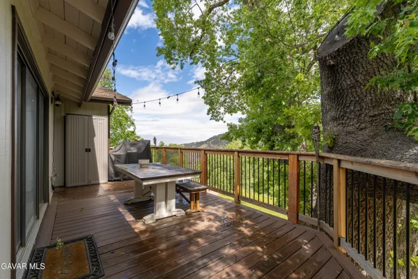 a view of backyard with furniture and garden