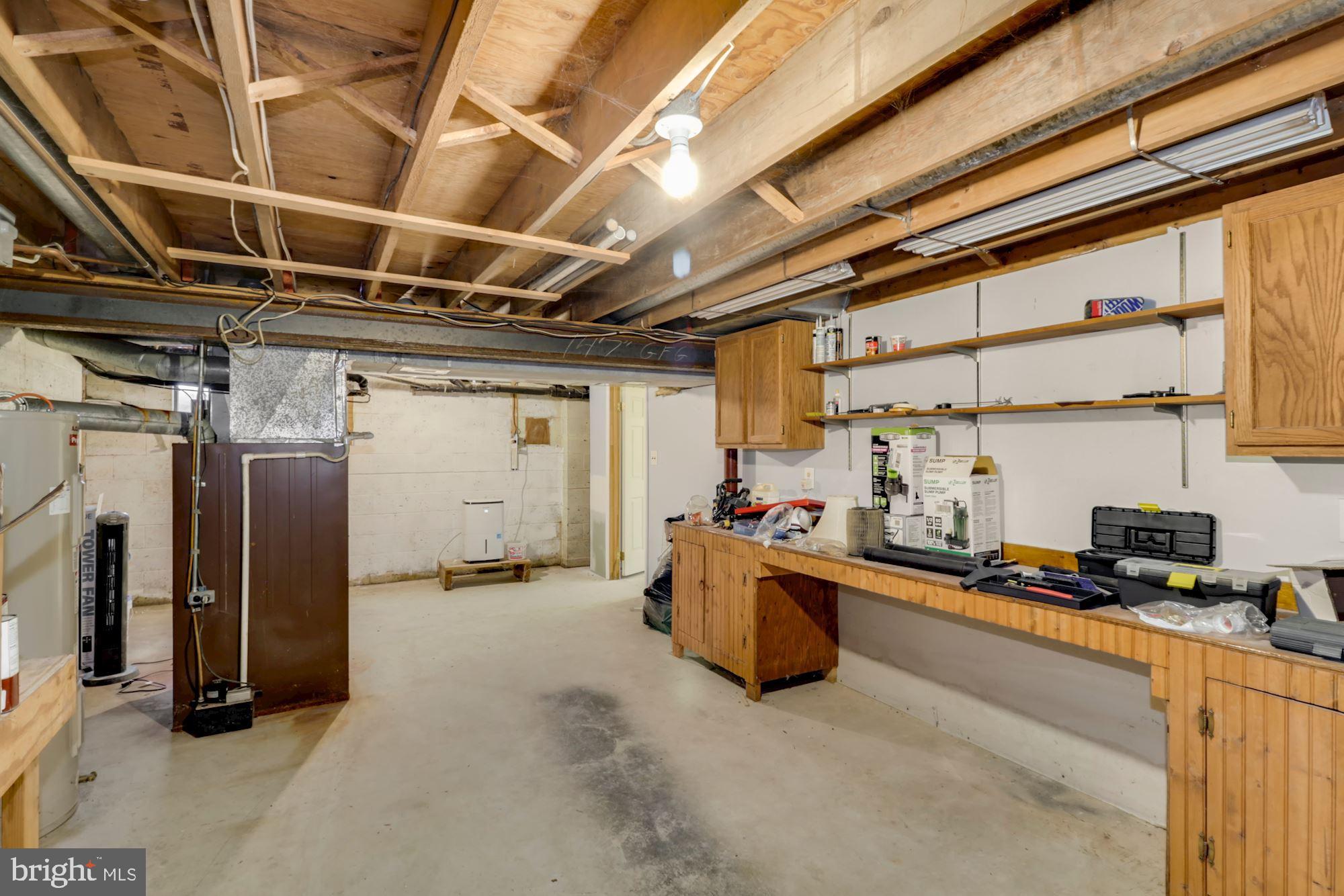 64 Eayrestown Road Medford, NJ 08055 - Photo 39 of 116 Basement work bench.