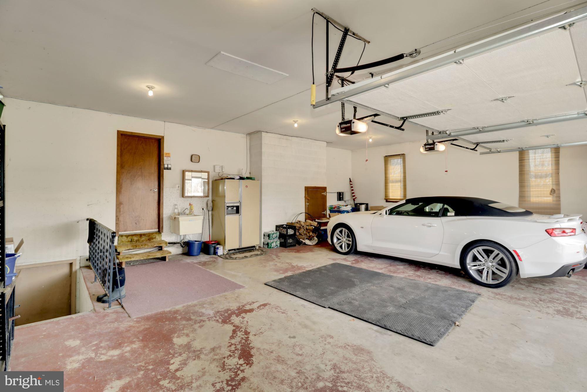 64 Eayrestown Road Medford, NJ 08055 - Photo 40 of 116 Oversized attached garage with basement walk out.