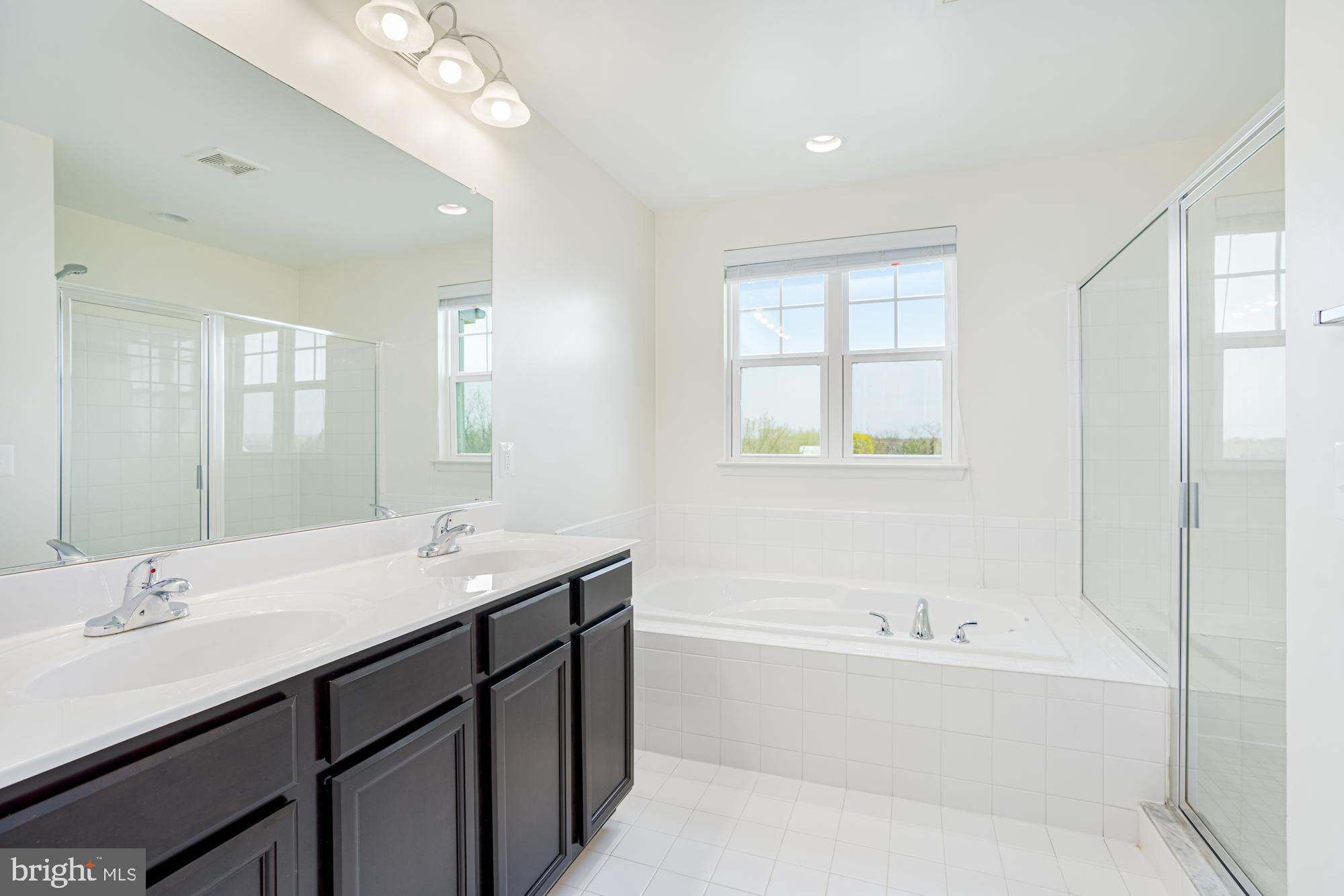 106 Splendor Garden Way Stephenson, VA 22656 - Photo 23 of 31 Bright and airy modern bathroom retreat.