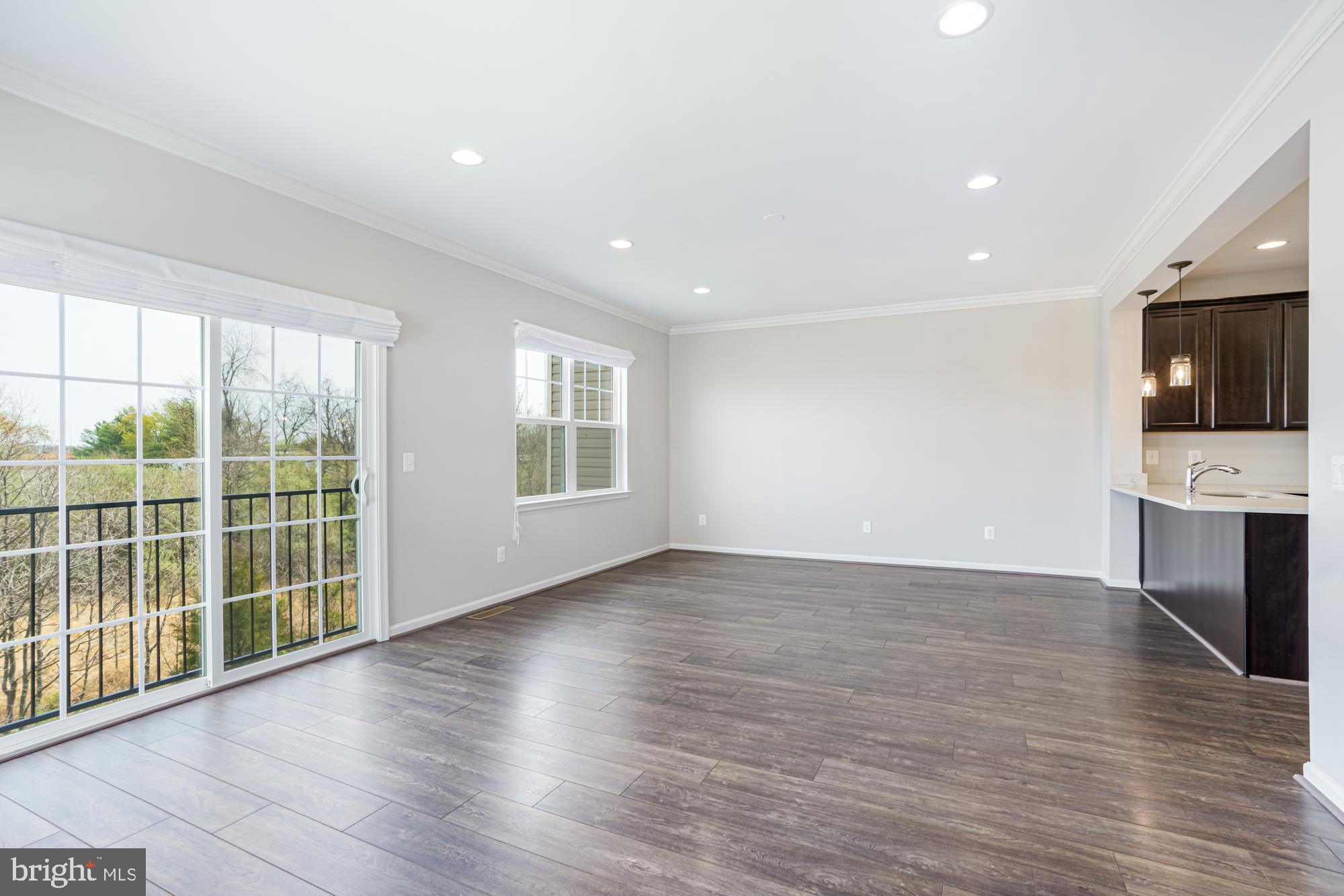 106 Splendor Garden Way Stephenson, VA 22656 - Photo 9 of 31 Spacious, sunlit living area with views.