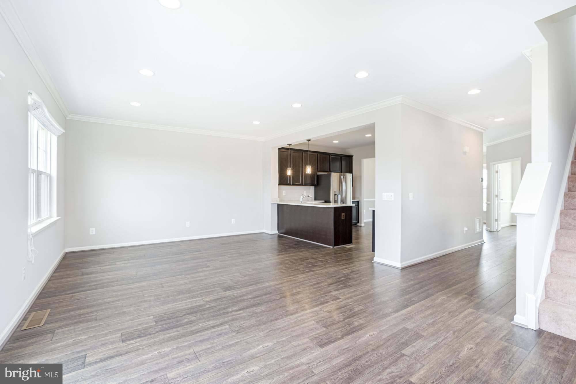 106 Splendor Garden Way Stephenson, VA 22656 - Photo 10 of 31 Spacious, modern living area with natural light.