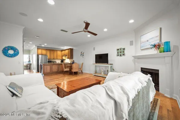 a bedroom with a large bed and a flat screen tv
