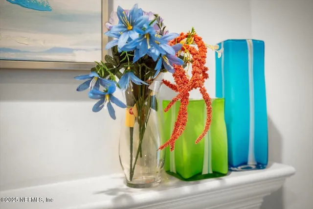 a view of a glass door with a potted plant