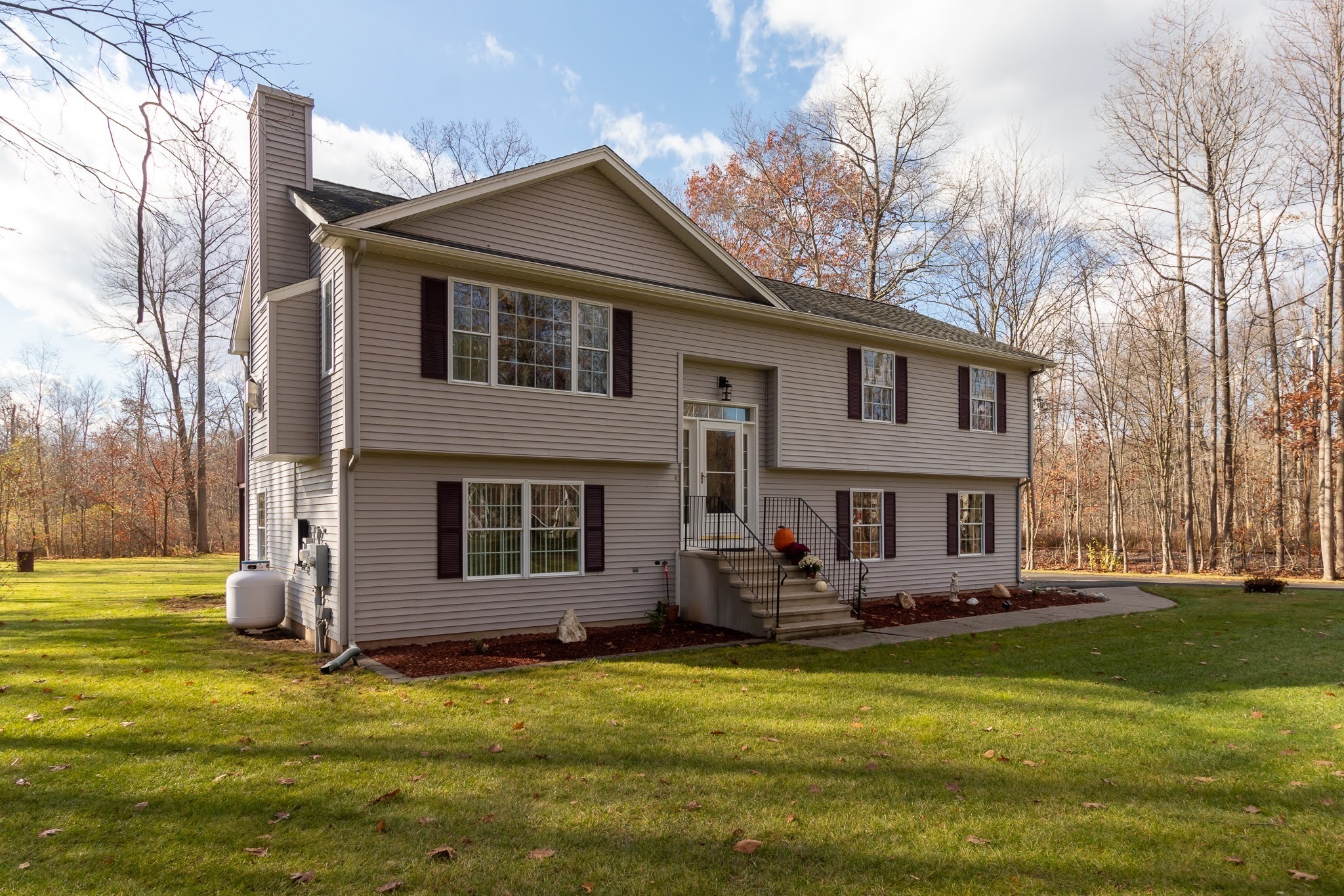 1001 Suffield Street Suffield, CT 06078 - Photo 2 of 36 a front view of house with yard and green space