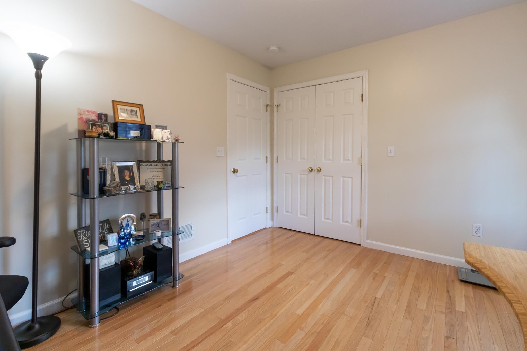 1001 Suffield Street Suffield, CT 06078 - Photo 24 of 36 a view of a room with wooden floor and closet