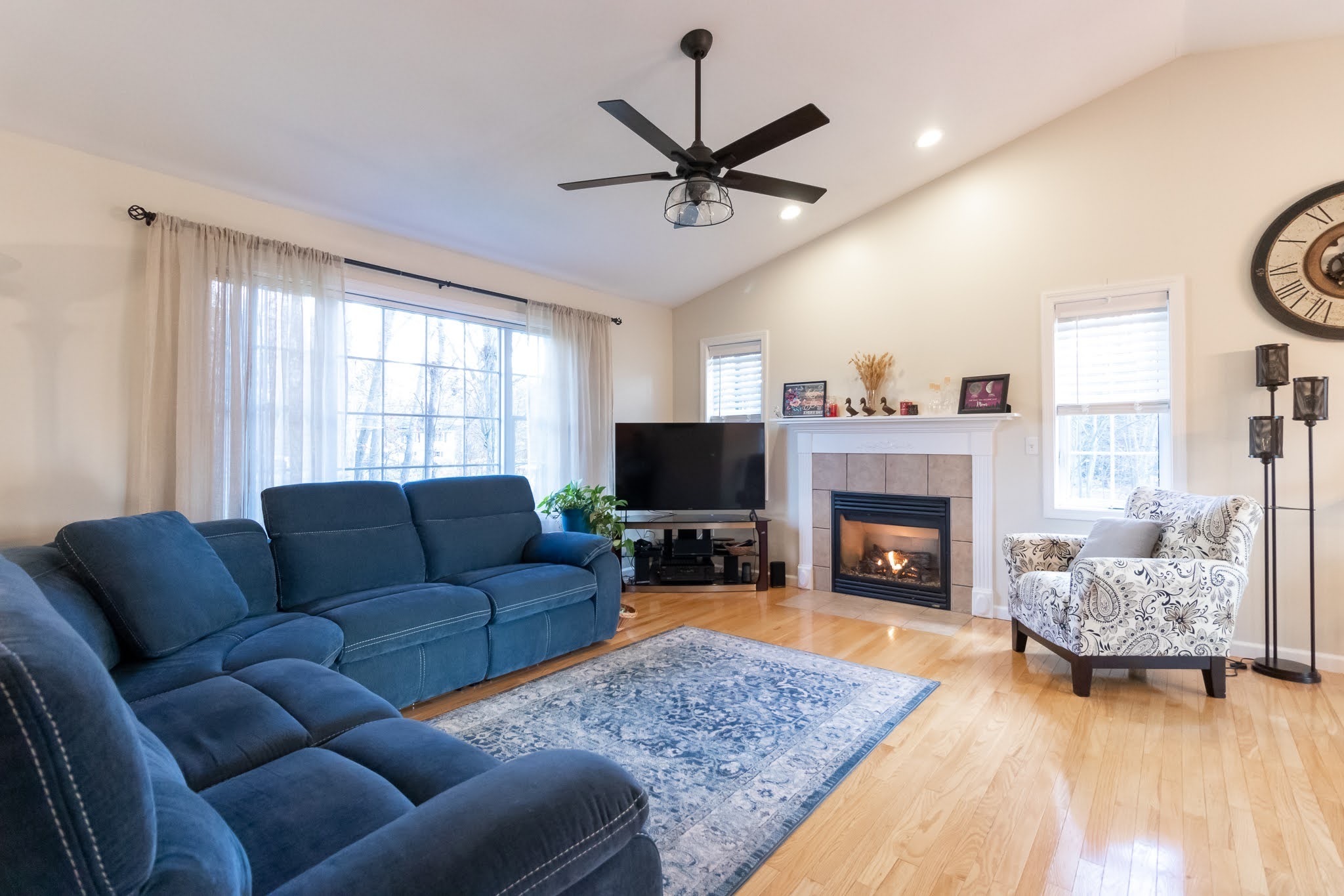 1001 Suffield Street Suffield, CT 06078 - Photo 5 of 36 a living room with furniture and a fireplace