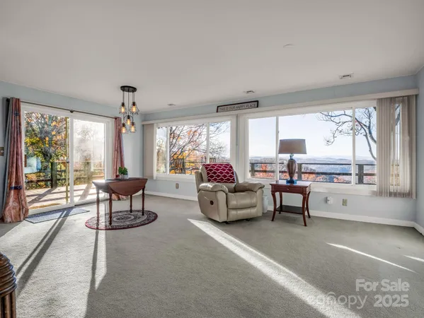 a kitchen with granite countertop wooden cabinets stainless steel appliances a sink and a window