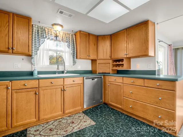 a bathroom with a sink and a stove