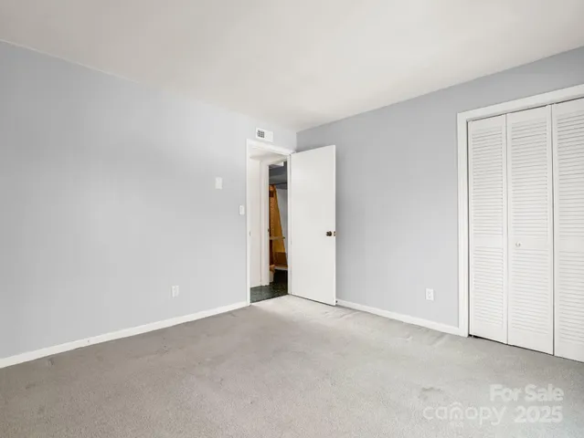 a view of a livingroom with furniture