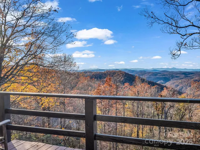a view of a chairs and table in the patio