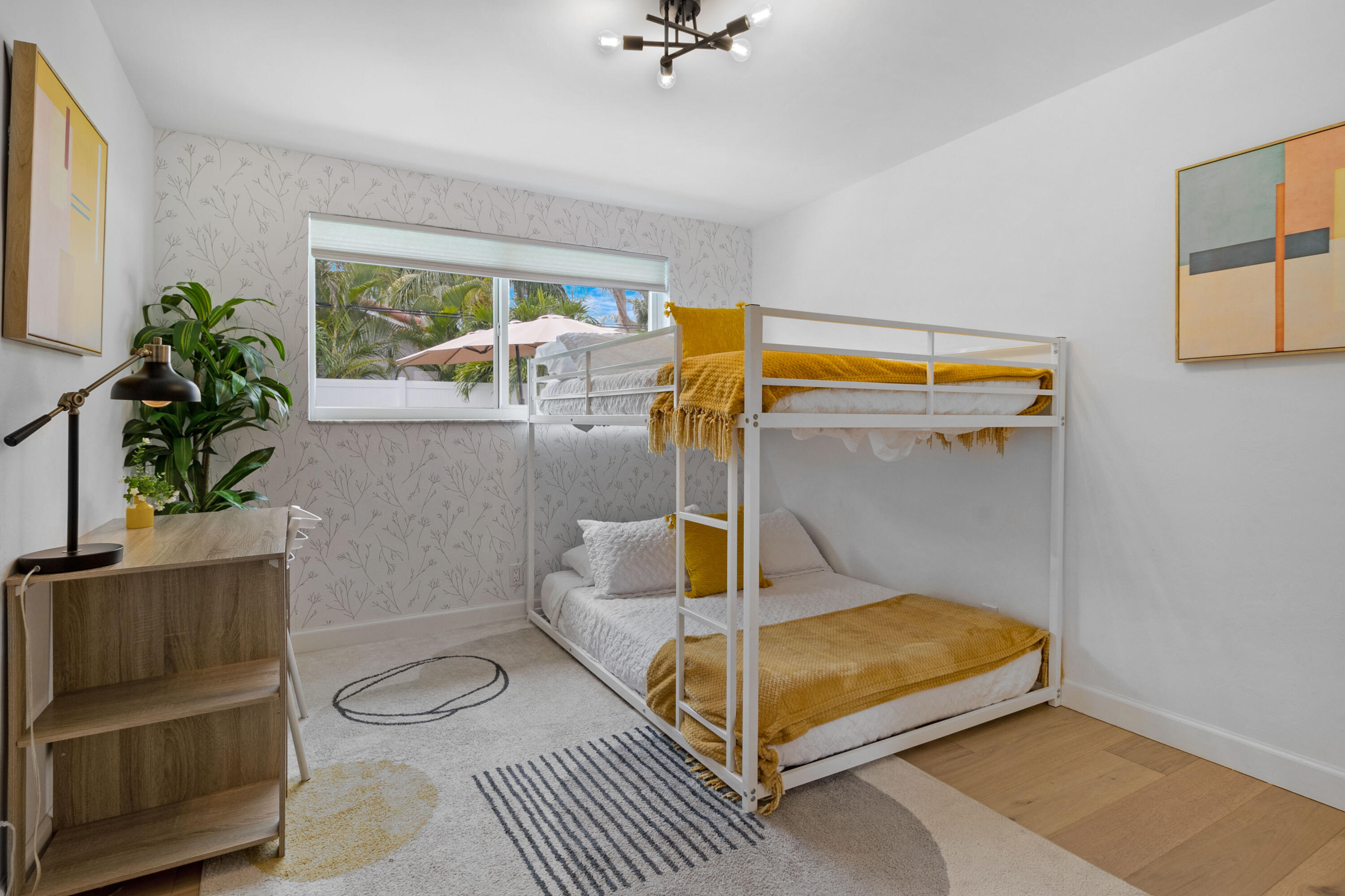 2862 Northeast 35th Court Lighthouse Point, FL 33064 - Photo 24 of 42 a bedroom with a bed and a potted plant
